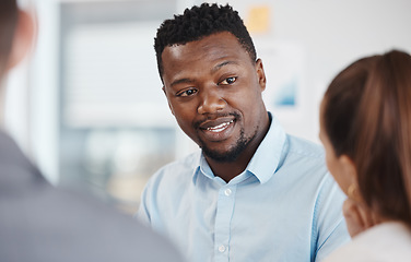 Image showing Business coach, management and a black man in meeting with team. Strategy, planning and teamwork, a businessman coaching men and women at startup. Leadership, working and brainstorming in the office.