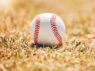 Image showing Baseball, sports and sport field on grass in nature on a outdoor training court. White ball on the ground for exercise, cardio training and fitness workout of player and athlete team game in autumn