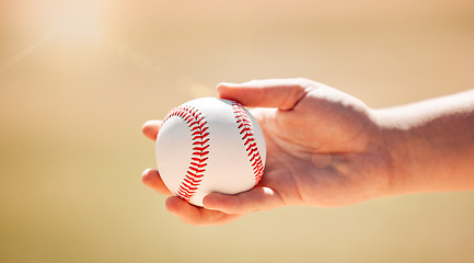 Image showing Baseball, sports and ball exercise of a hand about to pitch and throw in summer. Fitness, sport training and team player workout of a athlete in the sun outdoor for a competitive game in sunshine