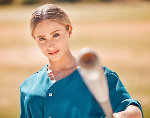 Image showing Baseball, softball sport and woman with bat ready for match or game on pitch or field outside. Exercise, fitness and sports portrait of training healthy female athlete workout for exercise or health