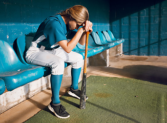 Image showing Baseball, sports bench and woman athlete angry thinking of game loss while waiting to play. Frustrated, sad and serious softball player girl in depressed mood for professional match failure.