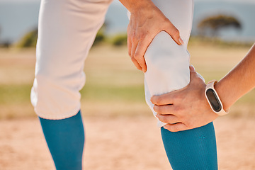 Image showing Sport, baseball and pain or injury for legs of athlete, player or sports woman on a baseball field. Emergency, accident and hurt girl holding knee after fitness, exercise and game training workout