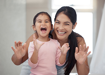 Image showing Portrait of mother and child, smile with teeth and morning routine. Asian woman and toddler girl showing clean teeth after brushing it in the bathroom for fun, learning and child development