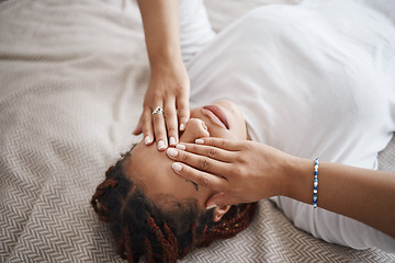 Image showing Insomnia and tired black woman relaxing on a bed in her bedroom thinking while covering her eyes. Depression, stress and mental health of a sad african girl with a headache after a breakup at home.