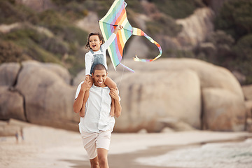 Image showing Family, kite flying and beach vacation with father and daughter walking while carrying on shoulders and enjoying a summer vacation or holiday. Man and excited girl child playing with energy in nature