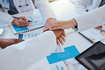 Image showing Collaboration, team and hands of doctor in meeting working on research for medical study or surgery. Teamwork, support and partnership for group of hospital healthcare worker with medicine documents