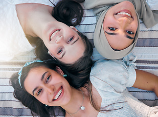 Image showing Portrait of happy girl friends relax outdoor and enjoy peace, freedom and friendship bonding time together above view. Face of diversity women, happiness and beauty as young group of people smile