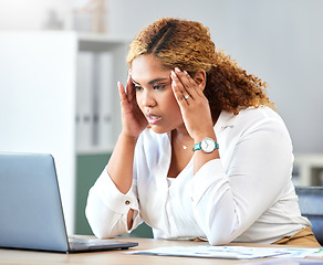 Image showing Stress, headache and tired business woman working on a report with a laptop in her modern office. Overworked, frustrated and corporate employee planning a company strategy document with a computer.