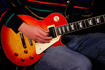 Image showing Strumming Electric Guitar