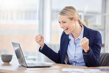 Image showing Success, celebration and business woman on a laptop at her desk in corporate modern office. Happy, celebrate and victory of professional manager with smile and pumping her fist in happiness and pride