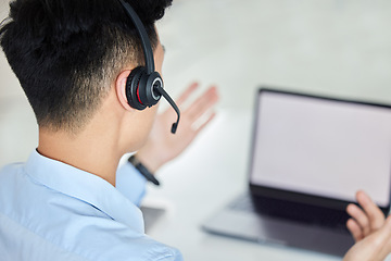 Image showing Call center, customer service and telemarketing with a man working on a laptop with a headset in his office. Crm, contact us and consulting with a male consultant at work in sales or support