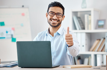 Image showing Work, success and thumbs up of business man at a computer happy in his office. Portrait of a corporate worker show winner, thank you and support hand sign with a smile working on company goal