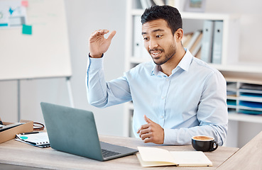 Image showing Man with laptop at desk on video call for work, via web in office with coffee and gesture with hand. Young man at table in home office, with computer on the internet for business call or webinar.