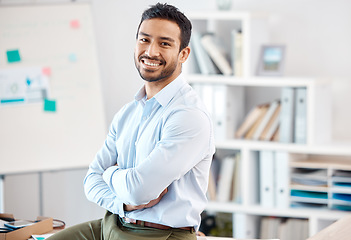 Image showing Portrait of Asian businessman working in office, smile for corporate success and management at startup company at work. Global leadership, happy employee and professional worker with arms crossed