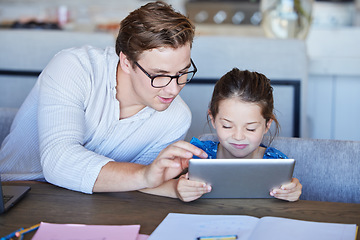 Image showing Education, learning and child development on digital tablet with father and daughter watching educational program at a table. Homework, homeschool and teaching parent help child with online homework