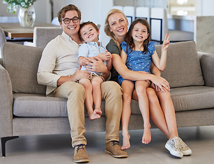 Image showing Mother, kids and father in a happy family portrait on sofa in a lovely home and enjoying quality time in the living room. Happiness, smile and young parents with smiling children relaxing together