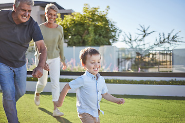 Image showing Family, grandparents and running with child in garden for happy, health and love together. Care, motivation and summer with elderly couple and kids on grass for youth, smile and game in neighborhood
