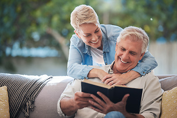 Image showing Mature couple, bond and funny book on house or home sofa in garden and backyard patio. Smile, happy or relax senior man and elderly woman in retirement hug, trust or security love marriage with novel