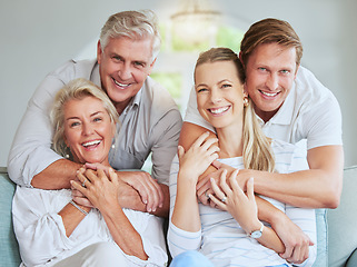 Image showing Smile, hug and portrait of happy family relax on living room sofa bonding, having fun and enjoy quality time together. Happiness and family generations of parents, daughter or son lounge at home