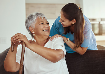 Image showing Happy, relax and senior woman with caregiver smile while sitting on a living room sofa in a nursing home. Support, help and professional nurse or healthcare worker helping elderly lady or patient