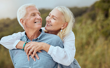 Image showing Love, happy and senior couple hug, relax or enjoy quality time together in nature countryside for calm, freedom or peace. Happy, smile or bonding elderly retirement man and woman on fun romantic date