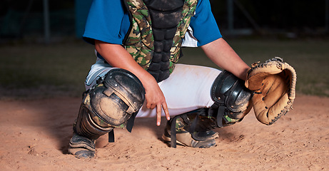 Image showing Baseball, player and sign of a sports hand gesture or signals for game strategy showing curveball on a pitch. Catcher holding ball glove in sport secret for team communication during match at night