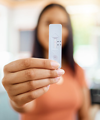 Image showing Woman hands, covid and negative rapid antigen test results for healthcare, medical risk and safety. Closeup of corona virus home testing kit, pcr cassette and medicine diagnostics check for wellness