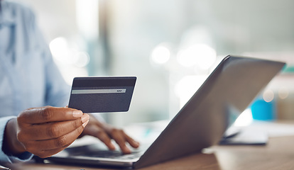 Image showing Ecommerce, online shopping and credit card payment on a laptop via the internet for easy and fast digital cash exchange. African persons hands typing banking information on fintech to transfer money