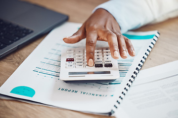 Image showing Hand of a woman working on a financial report with a calculator at her desk in the office. Professional accounting manager calculating the company finance budget, documents or bookkeeping paperwork.