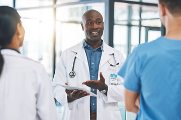 Image showing Team, nurse and medical doctors in a discussion about healthcare report, review and results in a hospital. Global, teamwork and leader in conversation with nursing professionals after office meeting