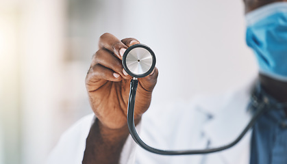 Image showing Healthcare, medical and doctors hand with stethoscope in hand of nurse for heartbeat or breathing in hospital office. Medicine, insurance and consulting with health professional in clinic