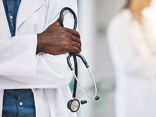 Image showing Healthcare, stethoscope in hand and African doctor in hospital. Black man or medical worker, leader in medicine and innovation in treatment. Confident, professional and expert patient care in Africa.