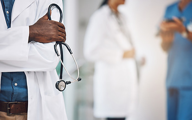 Image showing Hands, stethoscope and black man medical doctor at hospital to help, consulting research and healthcare exam. Male cardiologist professional with innovation medical tool for cardiology lab test work