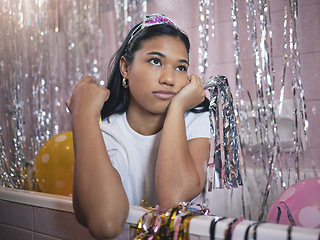 Image showing Girl in bath thinking during party with bored, tired or frustrated expression on face. Woman in bathroom, with crown and glitter from birthday celebration, feel sad, annoyed or disappointed in house