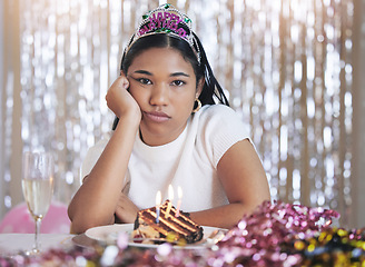 Image showing Bored, angry and birthday girl at a party at a celebration event with cake and candles upset. Portrait of a person from Mexico with sweet food feeling frustrated, sad and unhappy celebrating