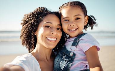 Image showing Beach, selfie and mother and daughter bonding and posing for a picture, relax and smiling on an ocean trip. Family, nature and happy mom enjoying free time with child, having fun on summer vacation