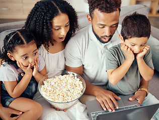 Image showing Family time, laptop and popcorn while watching a movie, streaming cartoons and looking shocked, surprised and scared. Wifi connection, online tv and bonding with kids, man and woman on couch at home