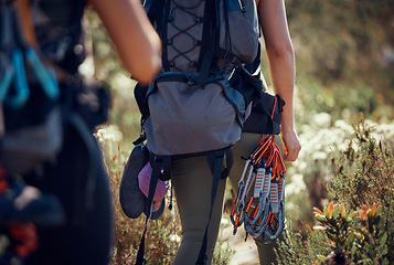 Image showing Rock climbing, fitness women and safety harness and equipment while hiking, travel and adventure for outdoor nature workout, travel and adventure. Active, sports and exercise while or mountaineering