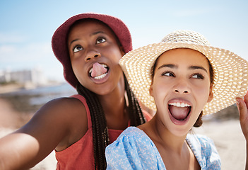 Image showing Women, fun and comic face selfie by beach, ocean and sea in Miami, Florida nature background. Friends, fashion tourist or students on summer travel location holiday with funny social media photograph