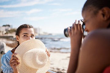 Image showing Travel influencer, women and photographer on beach for Miami, Florida social media review in content creator vlog. Play, bond and fun fashion friends by ocean sea background in photography photoshoot