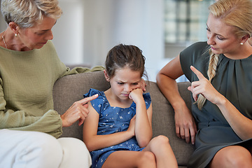 Image showing Family, discipline and warning by mother and grandmother hand sign to girl for bad behaviour on a sofa at home. Autism, adhd and communication by parent and daughter in conflict with attitude problem