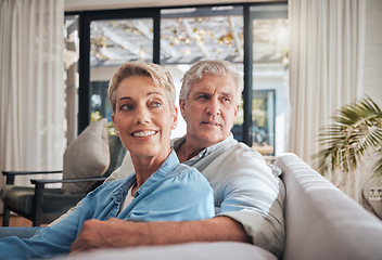 Image showing Thinking, future and senior couple sitting on the sofa at home dreaming about a carefree retirement together to relax and find peace. Mature man and woman looking away enjoying wellbeing and love