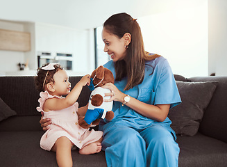 Image showing Pediatrician doctor consulting kid, teddy bear and happy healthcare checkup at home visit. Happy baby girl, occupational therapy and woman nurse therapist play in lounge for children wellness service