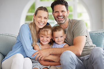 Image showing Family portrait, man and woman with children bonding in house living room, home interior and lounge sofa. Happy smile, love couple or mother and father with kids in trust, security and support hug