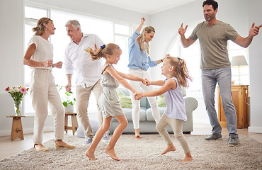 Image showing Happy, dance and love with big family in living room together for crazy, energy and excited. Lifestyle, freedom and celebration dancing at modern home with parents, children and grandparents