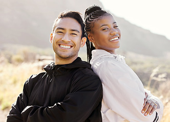 Image showing Fitness, nature and a man and black woman with smile go hiking or running. Strong and happy couple exercise and run together. Wellness, sports and health, runner and personal trainer workout in park.