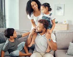 Image showing Smile, love and play of happy family home on living room sofa together for relax, care and lifestyle. Happiness, excited and fun relationship with parents, young children and quality time in lounge