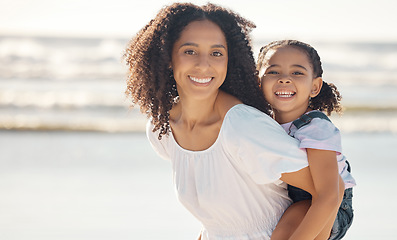 Image showing Mom, girl kid and family portrait at beach holiday, summer vacation and relaxing seaside together. Excited, smile and happy mom, young piggyback child and play, love and happiness sunshine at ocean