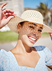 Image showing Happy, summer and a woman on holiday with hat and smile on face in the sun. Nature, sunshine and relax, girl outdoors on a tropical vacation, weekend away or time for freedom and fun in sunny weather