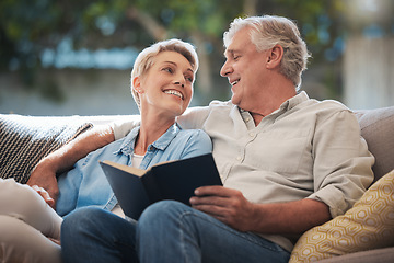 Image showing Senior, couple and pension people reading with a happy smile in a home living room sofa. Retirement of elderly man and woman smiling with calm happiness on a house couch with a book together